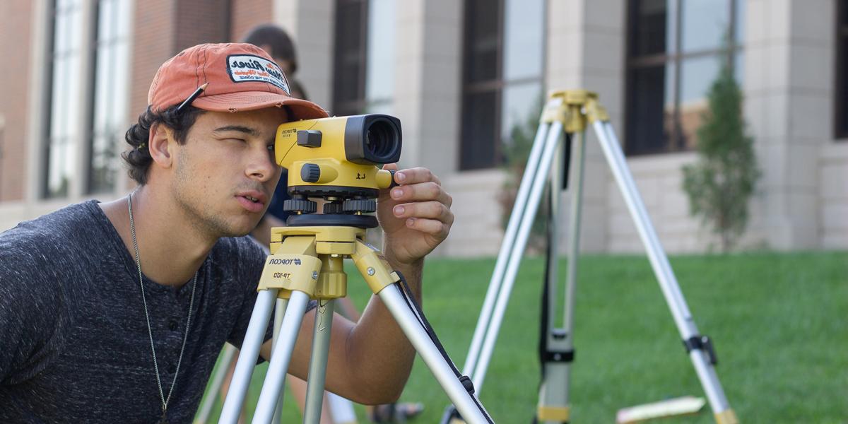 Students surveying 